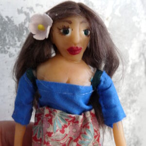 Cornelia - Doll with brown hair and flowery dress