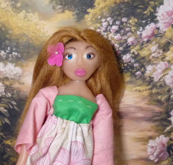 Frida - Doll with blonde hair and pink dress