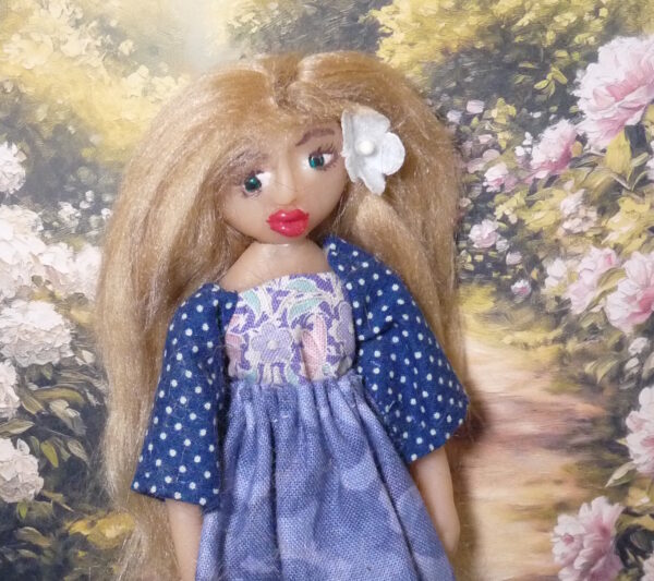 Ronja - Doll with blonde hair and purplish blue dress