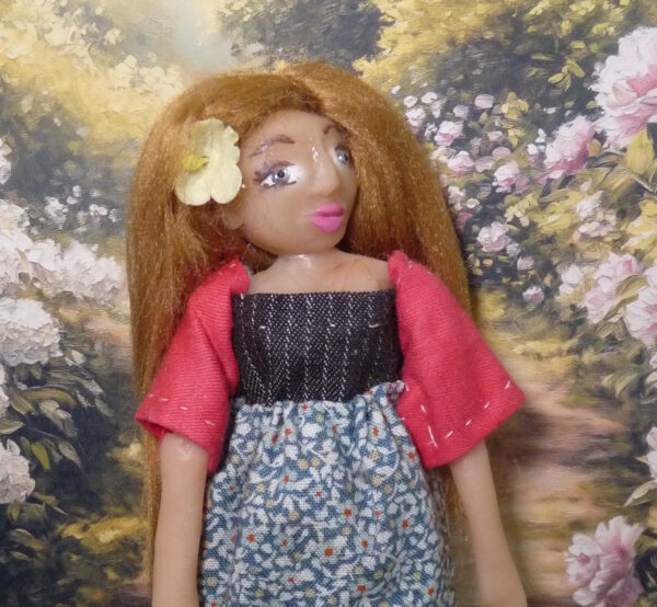 Sue - Doll with blonde hair and yellow rose