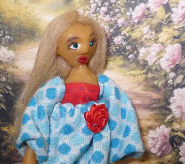 Ava - Doll in blue and red dress