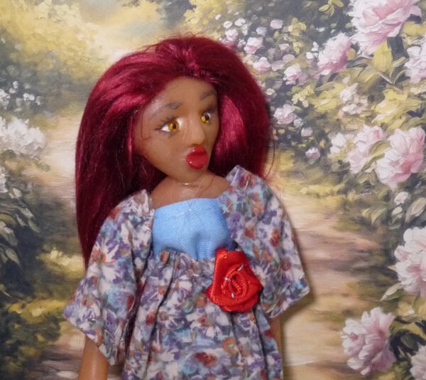 Camilla - Doll in purple and blue dress