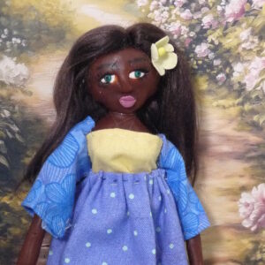Duni - Doll in purplish blue dress