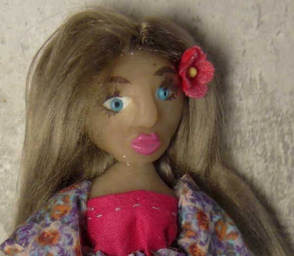 Enya - Doll with purple and red dress