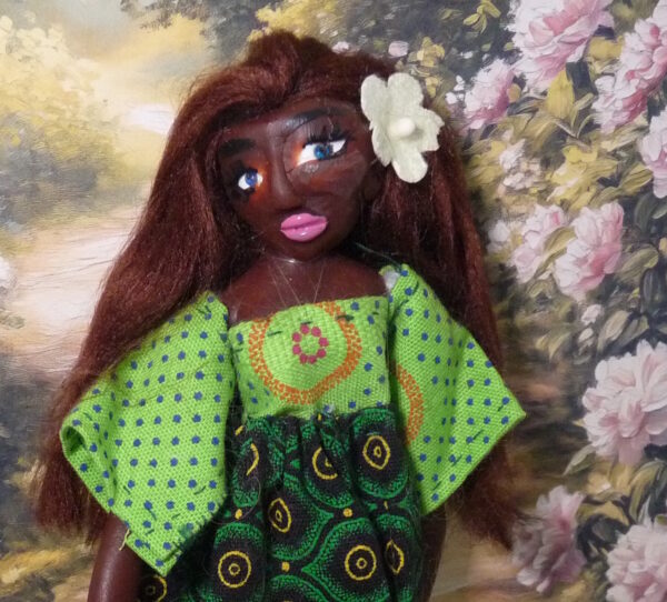 Jacee - Doll in green and black dress