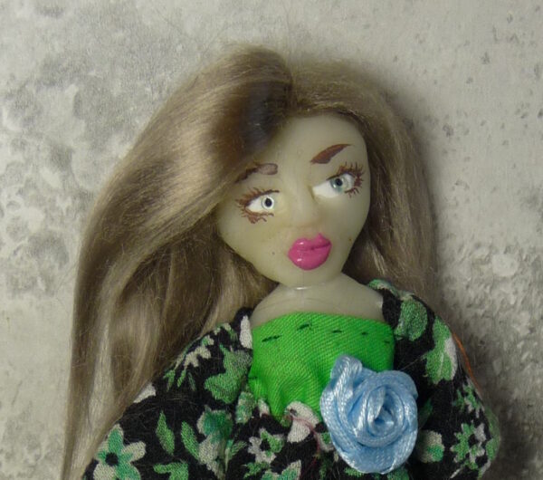 Lennon - Doll with green and black dress