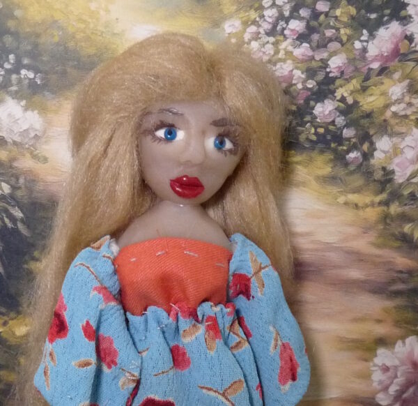Mila - Doll with blue and red dress