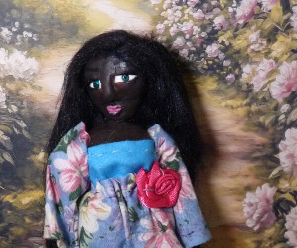 Oriana - Doll in blue and pink dress