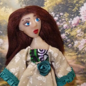Jannike - Doll in green and cream dress