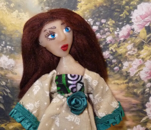 Jannike - Doll in green and cream dress